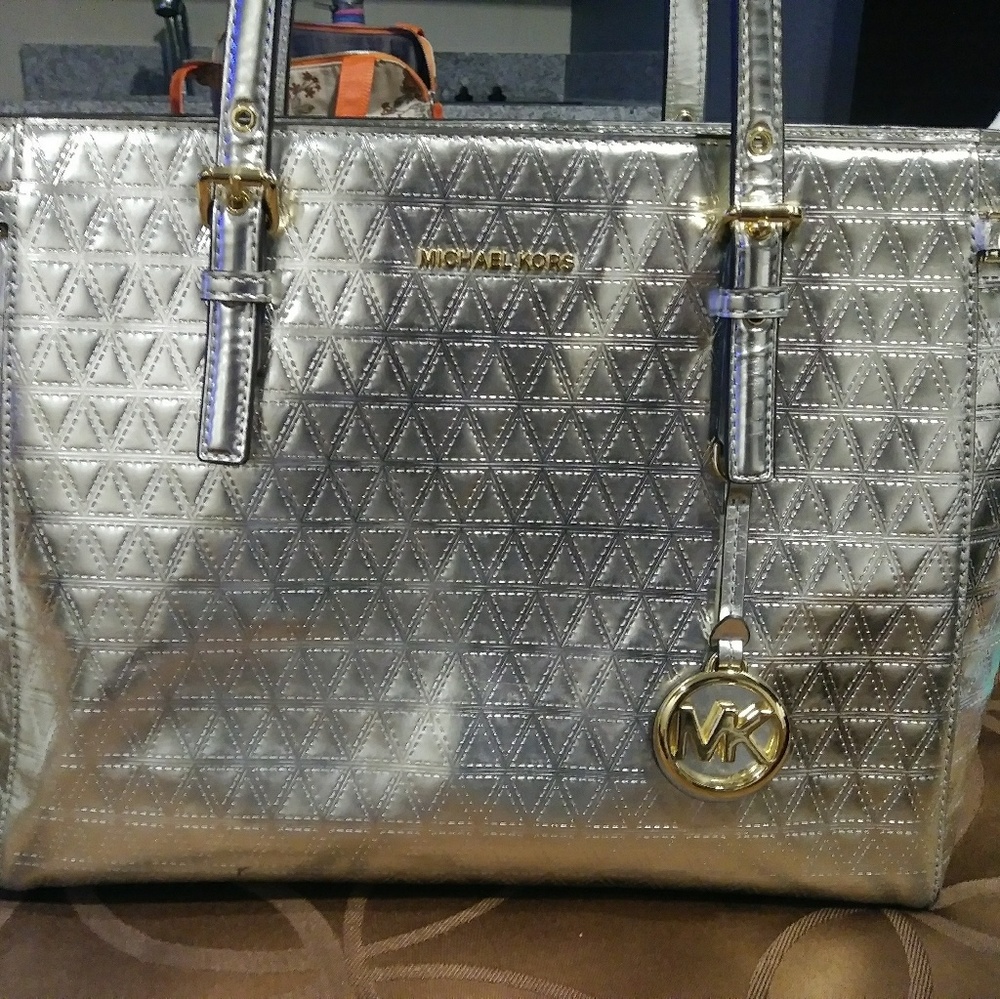 Still in stores Silver Metallic Michael Kors purse